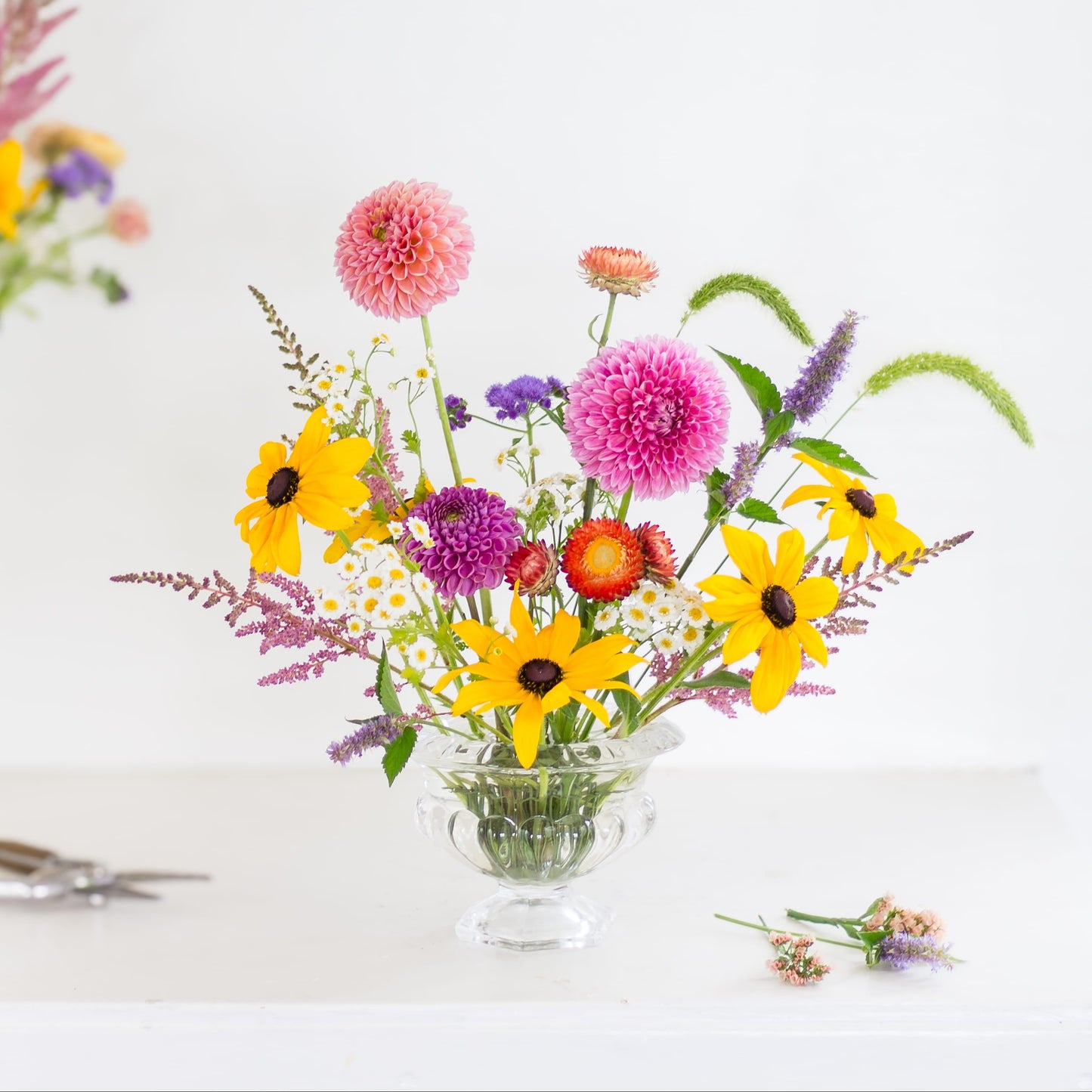 Round hairpin holder flower frog kenzan in clear vase with flowers. Made exclusively by Floral Genius