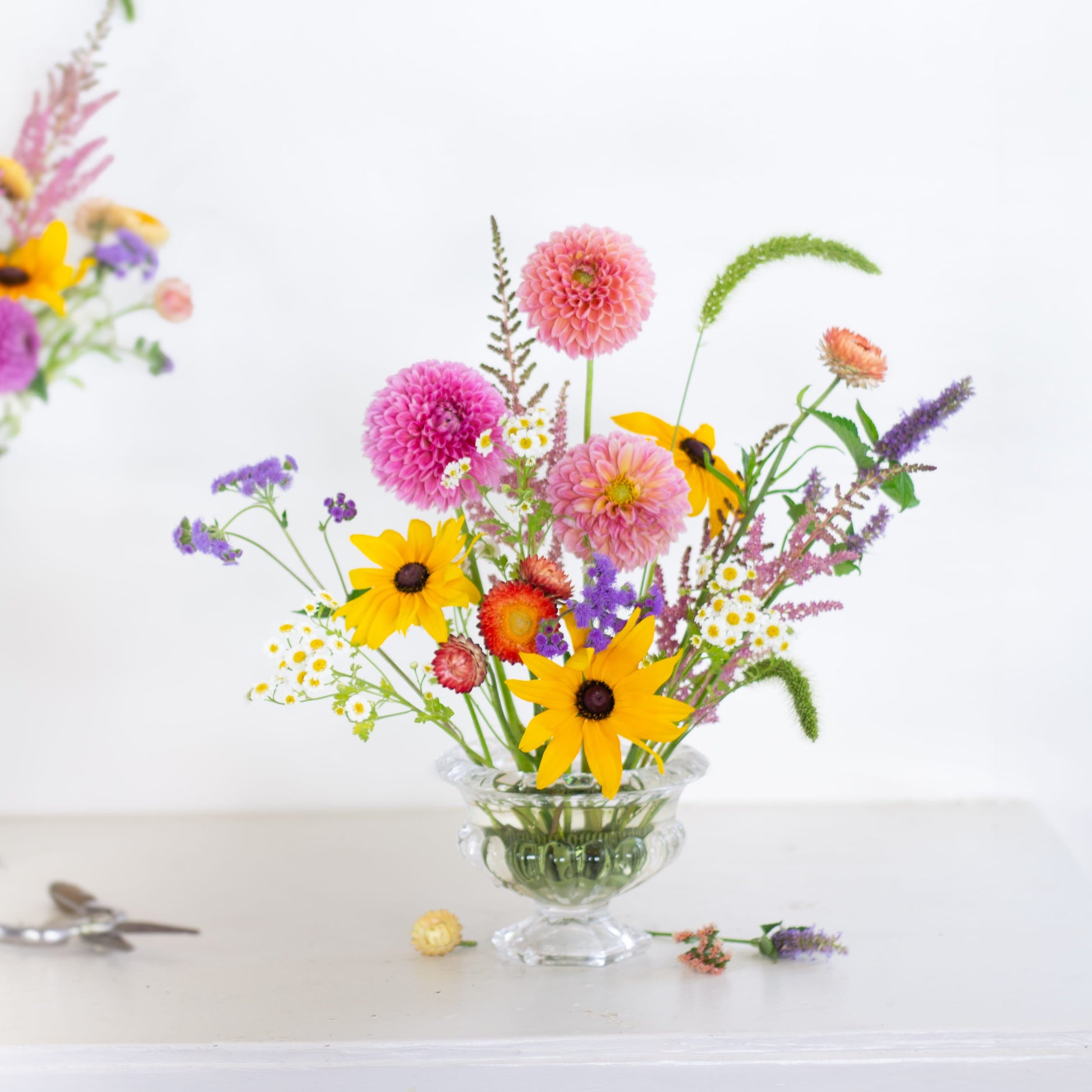 Round pin holder kenzan flower frog with flowers made by Floral Genius